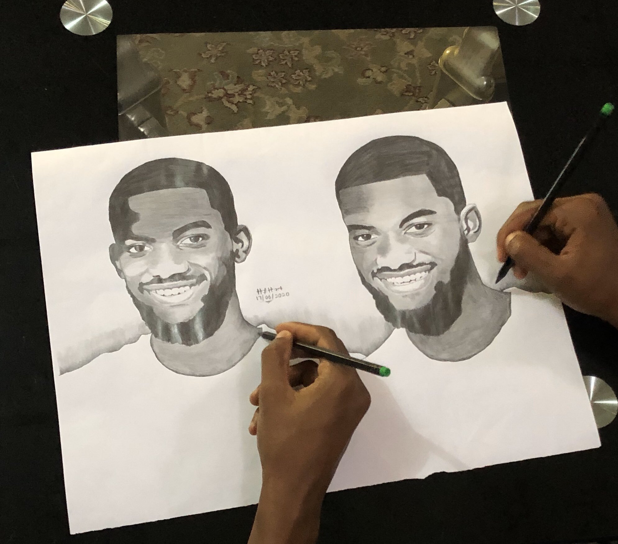 Talented twins draw themselves