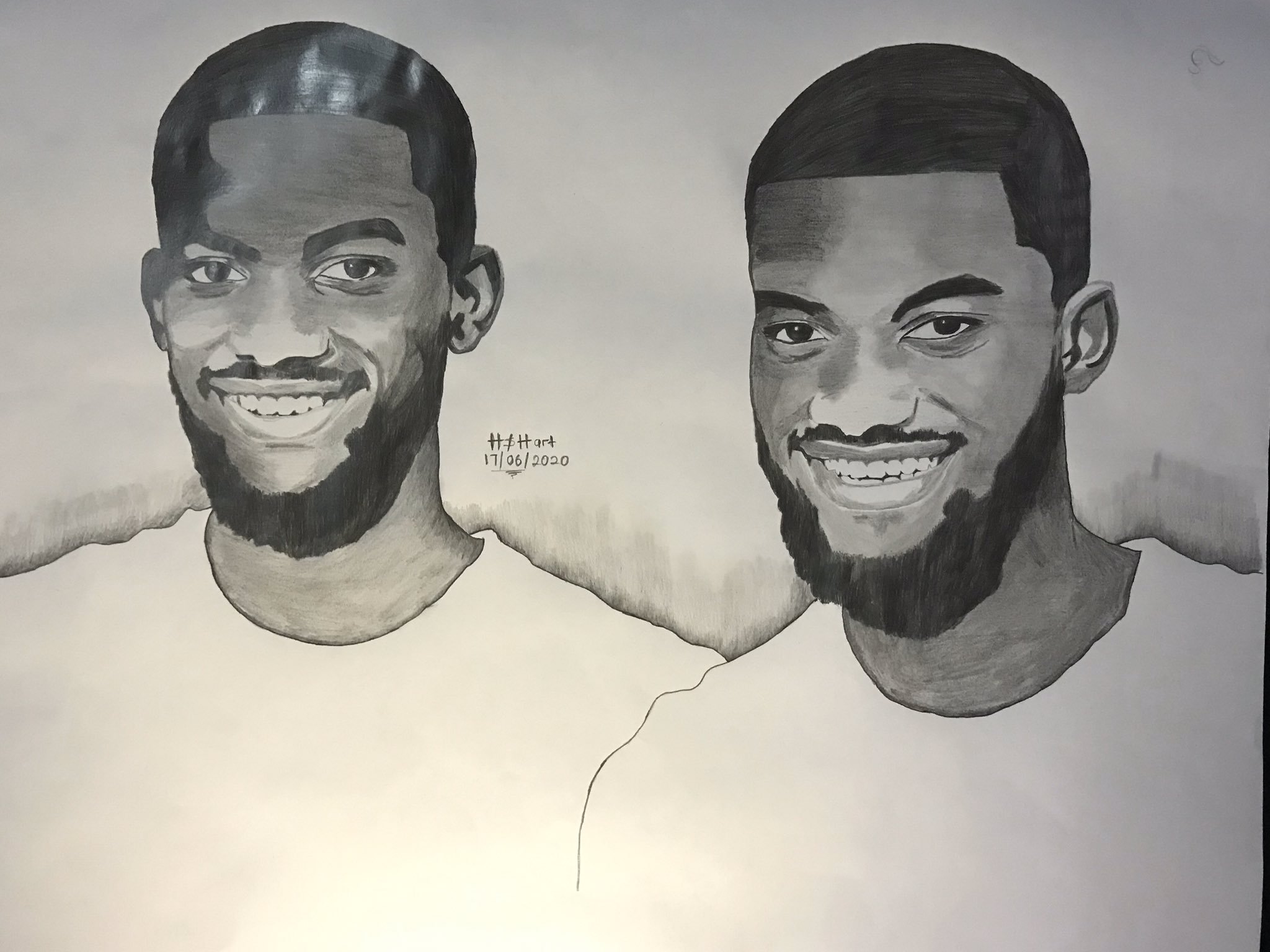 Talented twins draw themselves
