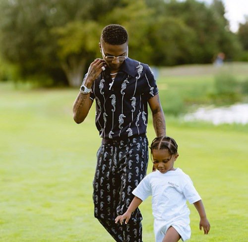 Wizkid steps with his son Zion